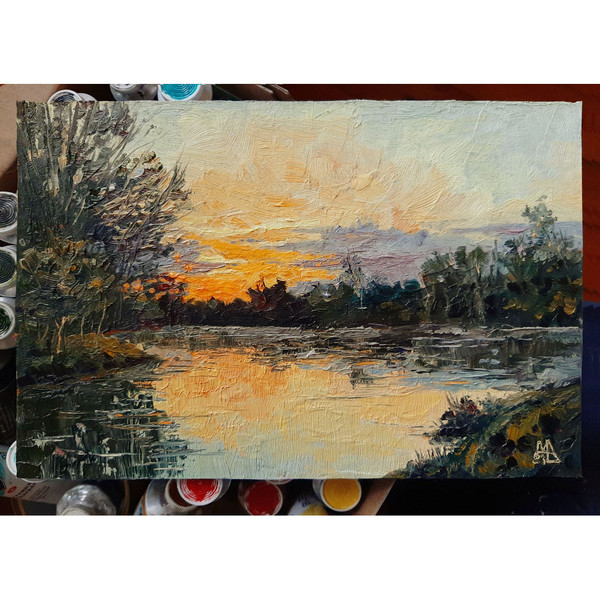 This Pond painting is a celebration of nature’s splendor. A calm Pond is depicted as an element of purity and clarity.