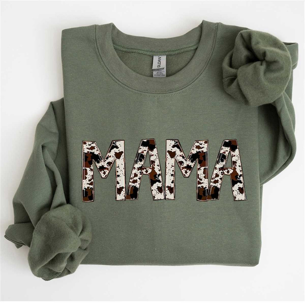 MR-2322024175925-a-green-shirt-with-the-word-mama-printed-on-it.jpg