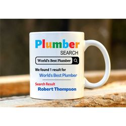 world's best plumber mug. personalised plumber gift. gift for plumber. phd graduation gift. plumber present.