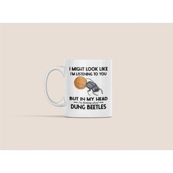 dung beetle gifts, funny dung beetle mug, i might look like i'm listening to you but in my head i'm thinking about dung