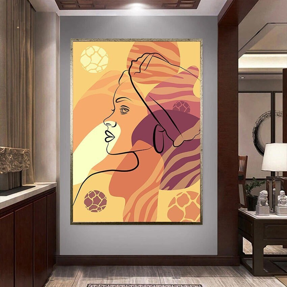 woman with feathers canvas wall art, orange background canvas wall art, portrait of african woman canvas wall art.jpg