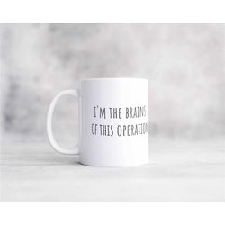 sarcastic coffee mug, brains of this operation, funny coffee mug, offensive mug, rude mug, workplace mug