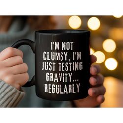 Funny Gravity Testing Quote Mug, Humorous Office Coffee Cup, Unique Gift For Coworker, White Ceramic Novelty Mug