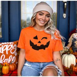 womens cute halloween winking pumpkin face t-shirt -