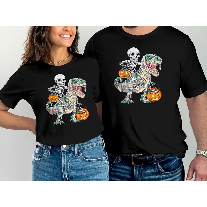 Skeleton Riding Mummy Dinosaur T-Shirt, Halloween T-Shirt, Halloween Party Tee, Mens Grey Raglan Tee, Funny Halloween Mens Gift Idea.jpg