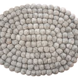 Cozy Crafted: Hand-Felted Ball Mat for Laptops/iPads