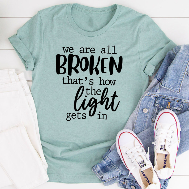 We're All Broken That's How The Light Gets In T-Shirt.jpg