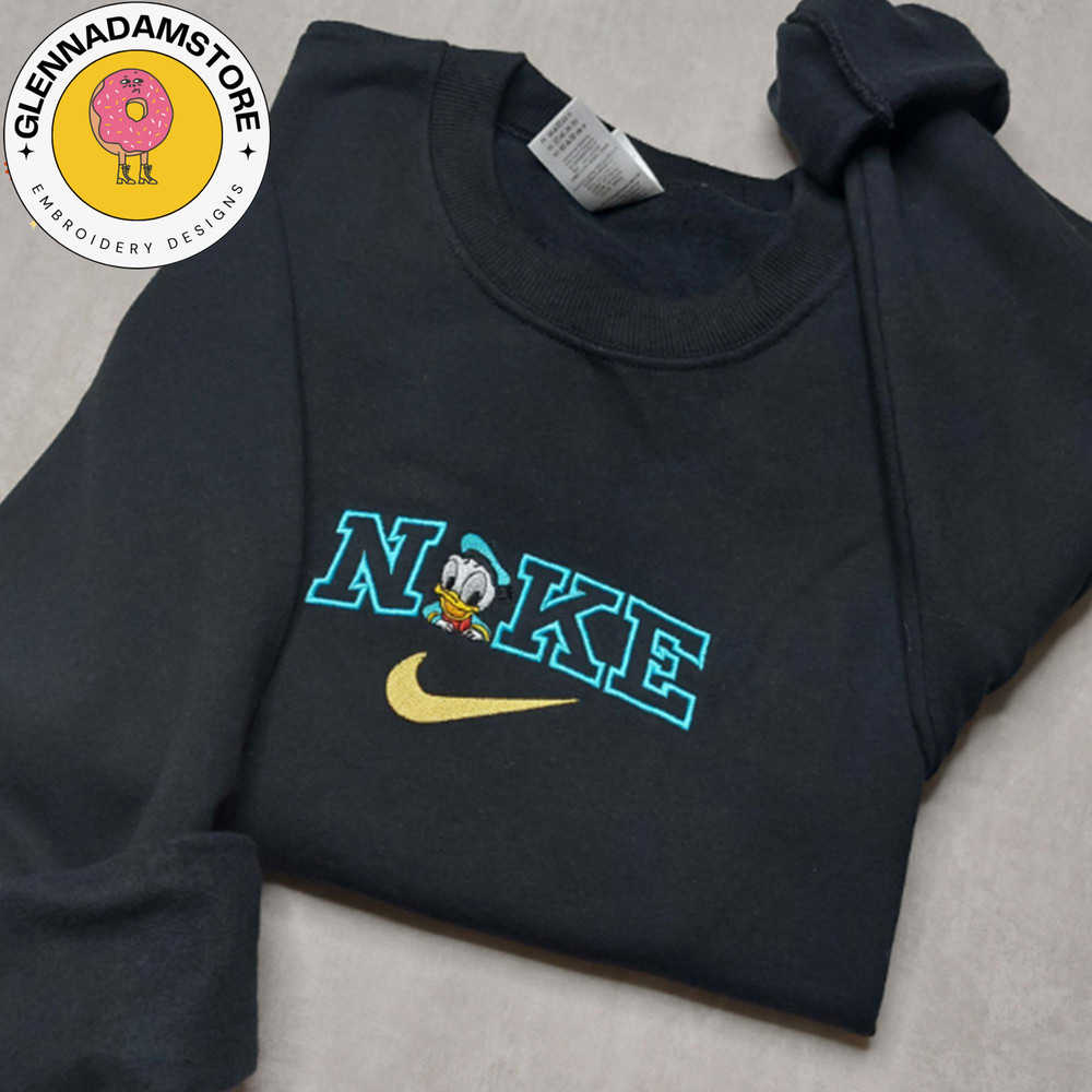 NIKE X Donald Duck Embroidered Sweatshirt, Brand Cartoon Embroidered Sweatshirt, Custom Cartoon Embroidered Crewneck.jpg