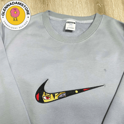 nike x sasuke embroidered sweatshirt, naruto manga embroidered sweatshirt, manga embroidered crewneck, anime sweatshirt