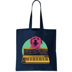 dog playing piano tote bag