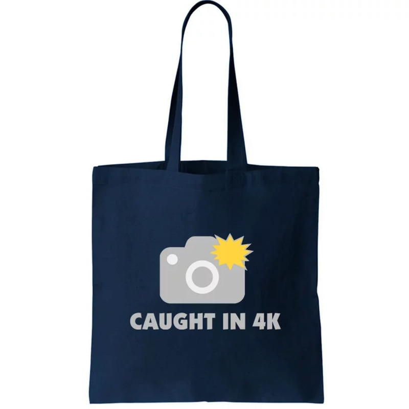 Caught In 4K Tote Bag.jpg