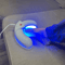 nail fungus light therapy device on toenail at home