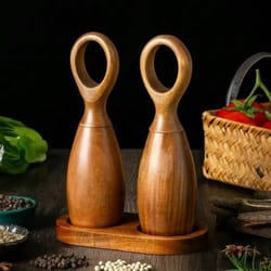 adjustable wooden salt and pepper grinder set with ceramic core and storage rack for spices