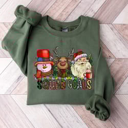 christmas heroes are santa claus reindeer and snowman together sweatshirt, squad goals christmas sweatshirt, funny chris