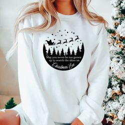may you never be too grown to search the skies on christmas eve holiday spirit shirt,winter clothing,cute christmas swea