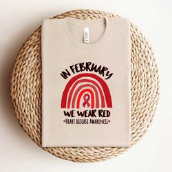 in february we wear red ribbon shirt