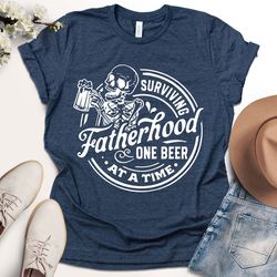 fatherhood surviving one beer at a time, skull, funny, fathers day shirt, trendy daddy shirt, dad , dad t-shirt, fathers