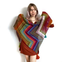 A one-of-a-kind handmade Boho-style wool shawl is a bright and warm accessory for cooler weather
