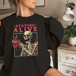 staying alive coffee sweatshirt, trendy sweatshirt, funny skeleton sweatshirt, halloween retro sweater for women stay ov