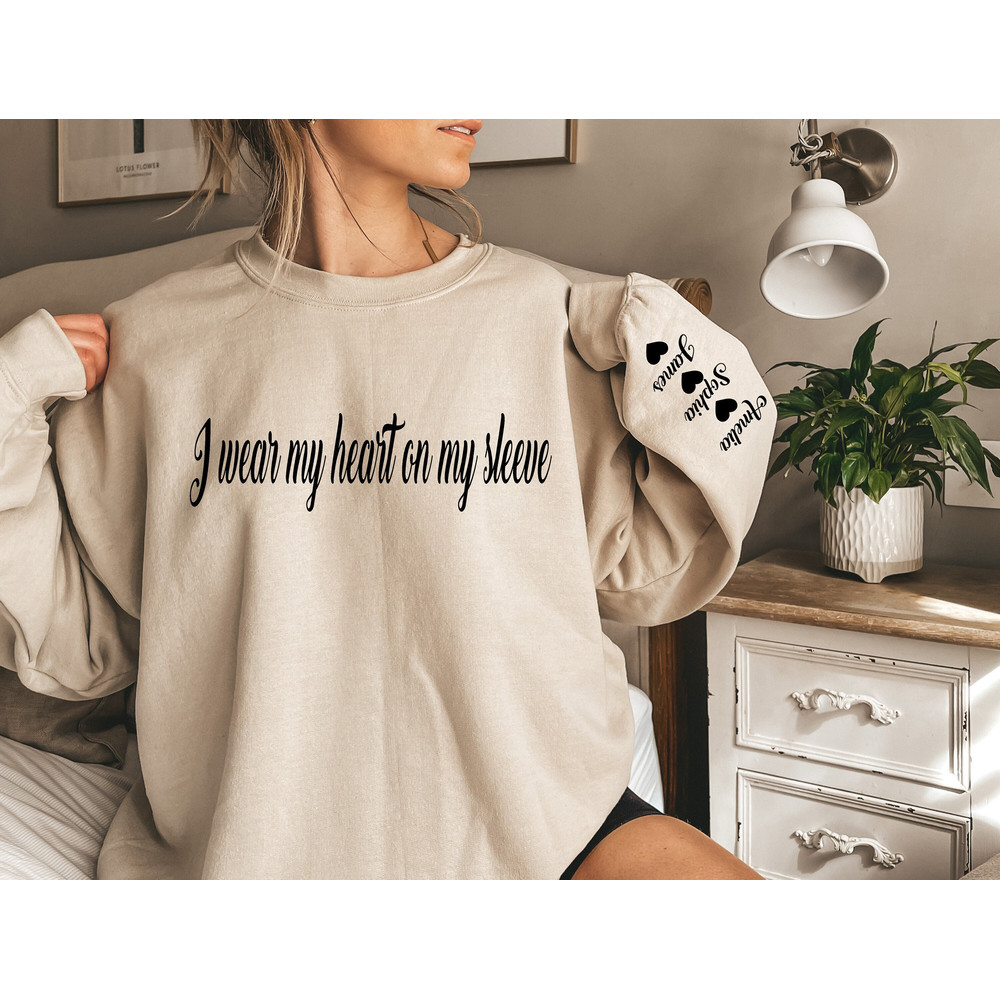 Personalized Mom Sweatshirt With Kid Names,Mom Sweatshirt,I Wear My Heart On My Sleeve,Mama Sweatshirt,Mothers Day Gift,Kids Names On Sleeve.jpg