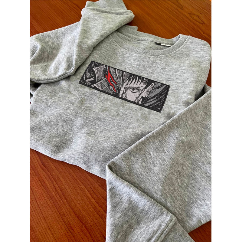 GUTS BLACK AND WHITE FRAME ANIME Embroidered Sweat1.jpg