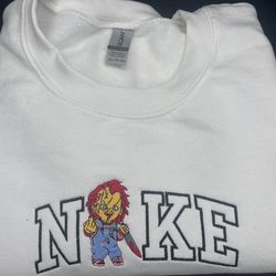 halloween chucky ni-ke logo embroidered shirt, chucky embroidery t-shirt, chucky embroidered sweatshirt, chucky embroide