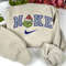 Happy Grinch Face Blue Nike Embroidered Sweatshirt Christmas Xmas.jpg