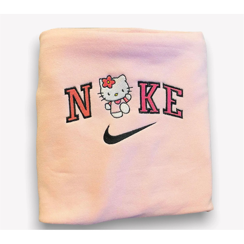Hello Kitty Nike Logo Embroidered Shirt, Hello Kitty Embroidery T-Shirt, Hello Kitty Embroidered Sweatshirt, Hello Kitty Embroidered Polo Shirt 1.jpg