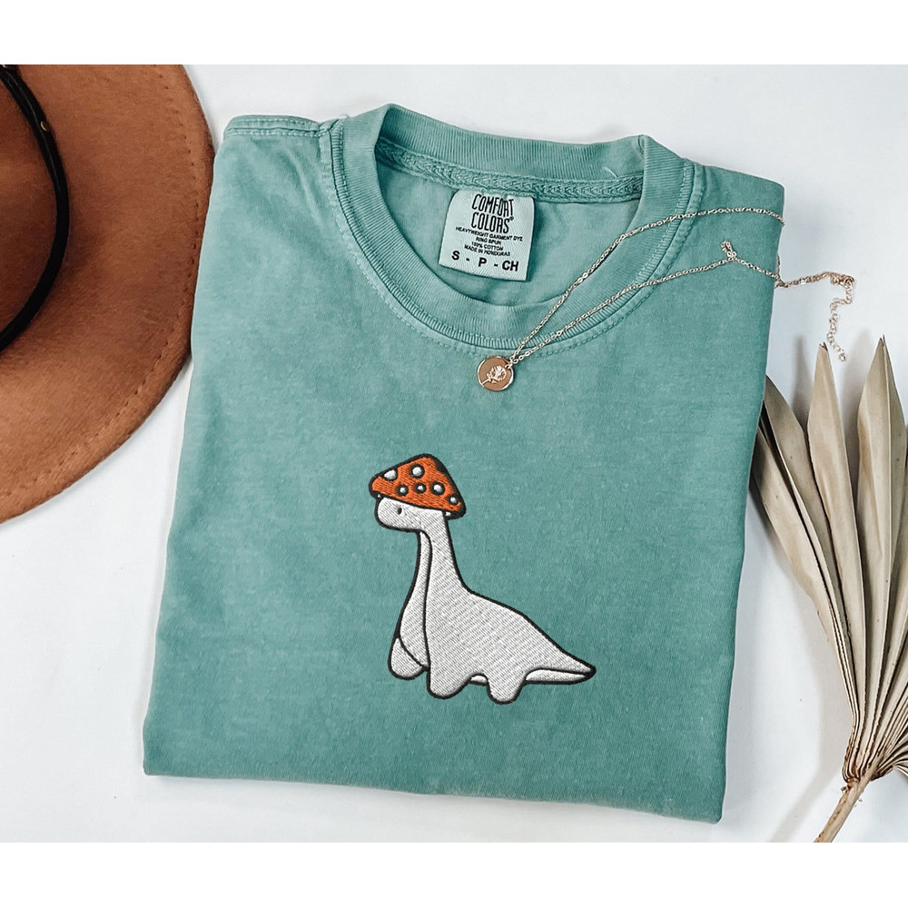 Embroidered Mushroom Dinosaur Comfort Colors Tshirt Dinosaur Shirt Paleontology Shirt Dino Shirt Velociraptor Shirt Trex Shirt Dinosaur Gift.jpg