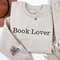 Custom Embroidered Book Lover Sweatshirt, Book Floral Bookish Embroidery Shirt, Name on Sleeve, Reading Book, Personalized Gift For Bookworm.jpg