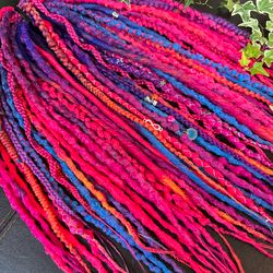Mix of DE decorated dreadlocks in pink blue purple colors, soft and lightweight magenta synthetic double ended dreads