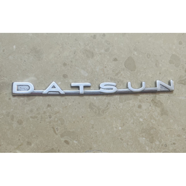 Datsun Bluebid 3 Piece Emblem Set 3.jpg