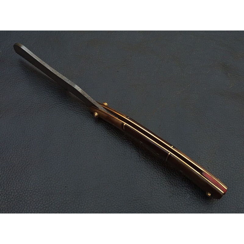 Shop now for this handmade Damascus steel razor knife