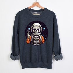 halloween astronaut skeleton sweatshirts, sweatshirt, halloween skeleton sweatshirt, astronaut sweatshirt, halloween spa