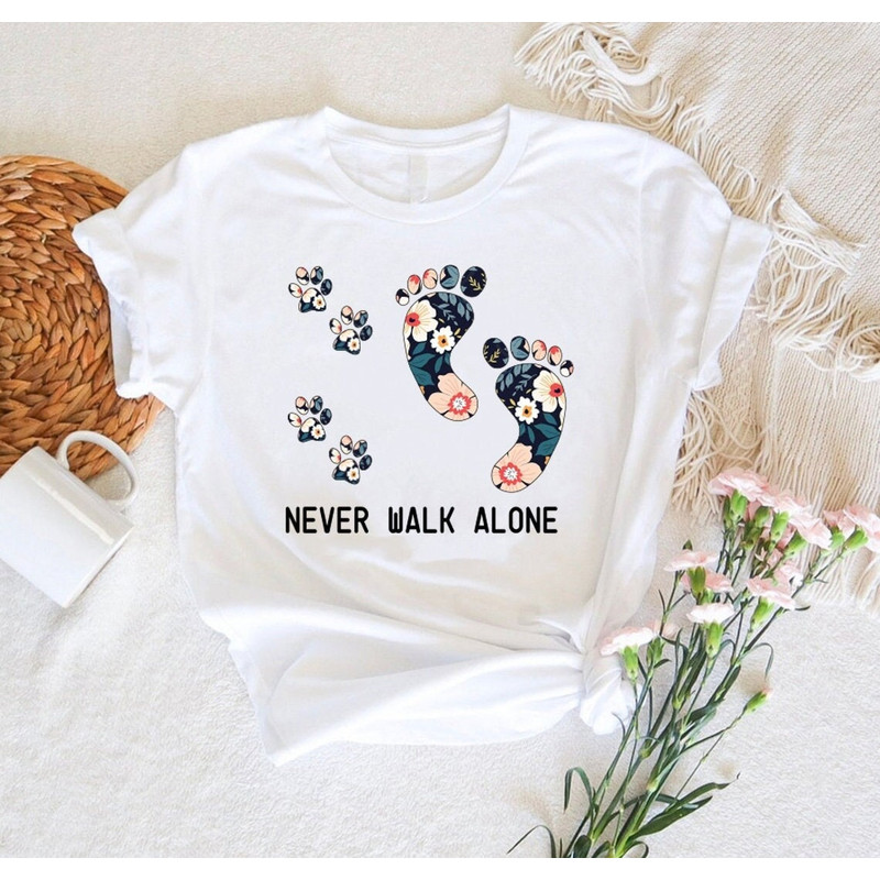 Floral Dog Paw Print Shirt,Dog Mama T-Shirt,Dog Lovers Gift,Animal Lover Outfit,Never Walk Alone Sweatshirt,Footsteps Shirt,Pet Friendship.jpg