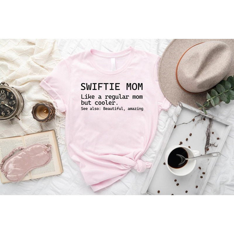 Swiftie Mom Shirt,Trendy Mama Birthday Gift,Not Like A Regular Mom T-Shirt,Mothers Day Sweatshirt,Swiftie Tee For Mother,Women Unisex Outfit.jpg