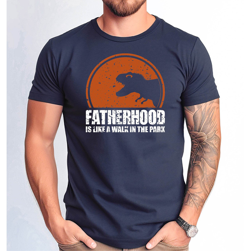 Fatherhood is Like a Walk in the Park Tee , Father's Day Tee,Dinosaur Party Shirt, Daddy Tee, Gift for Dad, Dinosaur Dad Shirt, Dad Life Tee.jpg