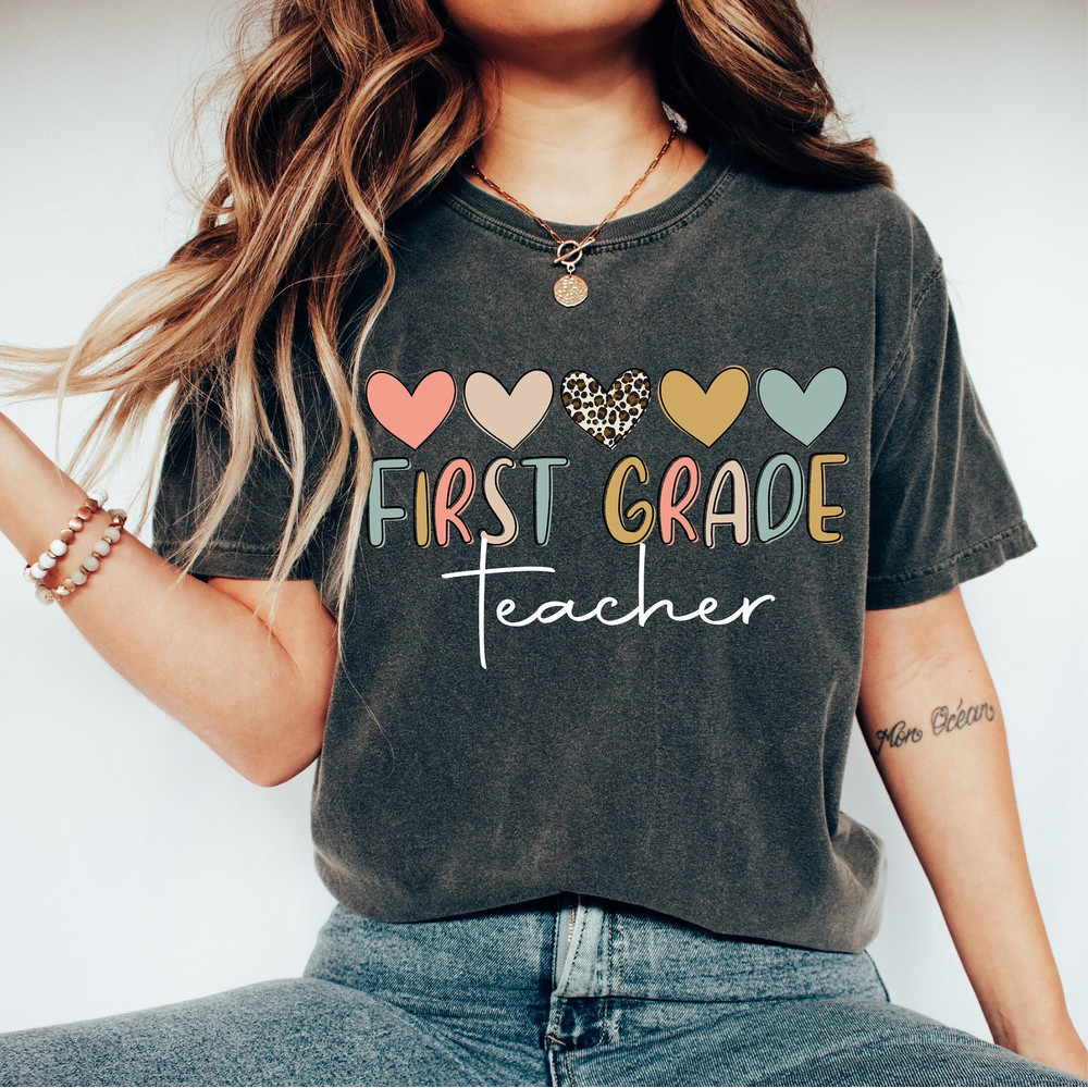 Comfort Colors®Cute First Grade Teacher Shirt, Back To School, Kindergarten Teacher Shirt, Elementary School Teacher Shirt, New Teacher Gift.jpg