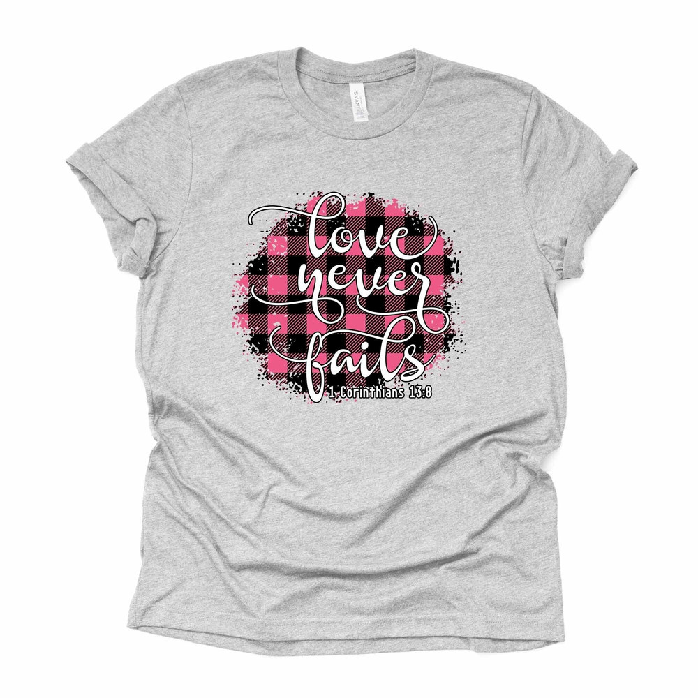 Love Never Fails, Pink Buffalo Plaid, 1 Corinthians 138 Design, premium unisex tee, 3 color choices, 3x valentine, 4x valentine, plus size.jpg
