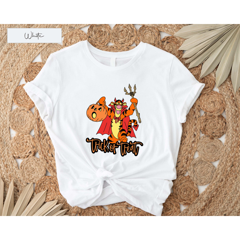 disney halloween,trick or treat shirt,boo shirt,spooky shirt,boo halloween shirt,skeleton shirt,tigger shirt,tigger,winnie the pooh shirt.jpg