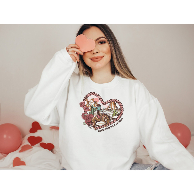 Cupid Find Me A Cowboy Sweatshirt, Howdy Valentine Sweatshirt, Cowboy Shirt, Valentines Day Sweatshirt, Couple Shirt.jpg