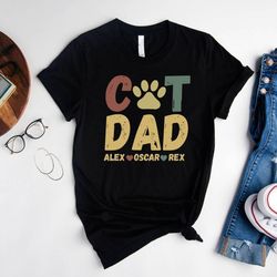 personalized cat dad shirt,funny cat dad shirt,cat themed gifts for men,custom cat dad shirt with pet names,cat paw grap