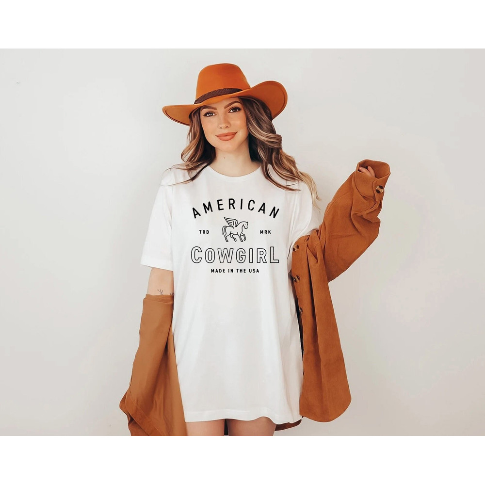 American Cowgirl shirt, cowgirl shirt, Country Girl Shirt, cowboy shirt, rodeo shirt, Howdy Shirt, texas sweatshirt, Western Graphic Tee,.jpg