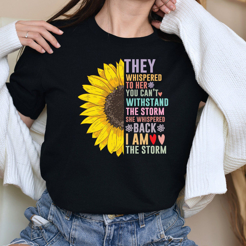 They Whispered To Her You Cannot Withstand The Storm She Whispered Back I Am The Storm Shirt, Women Empowerment Shirt, Sunflower Faith Tees.jpg