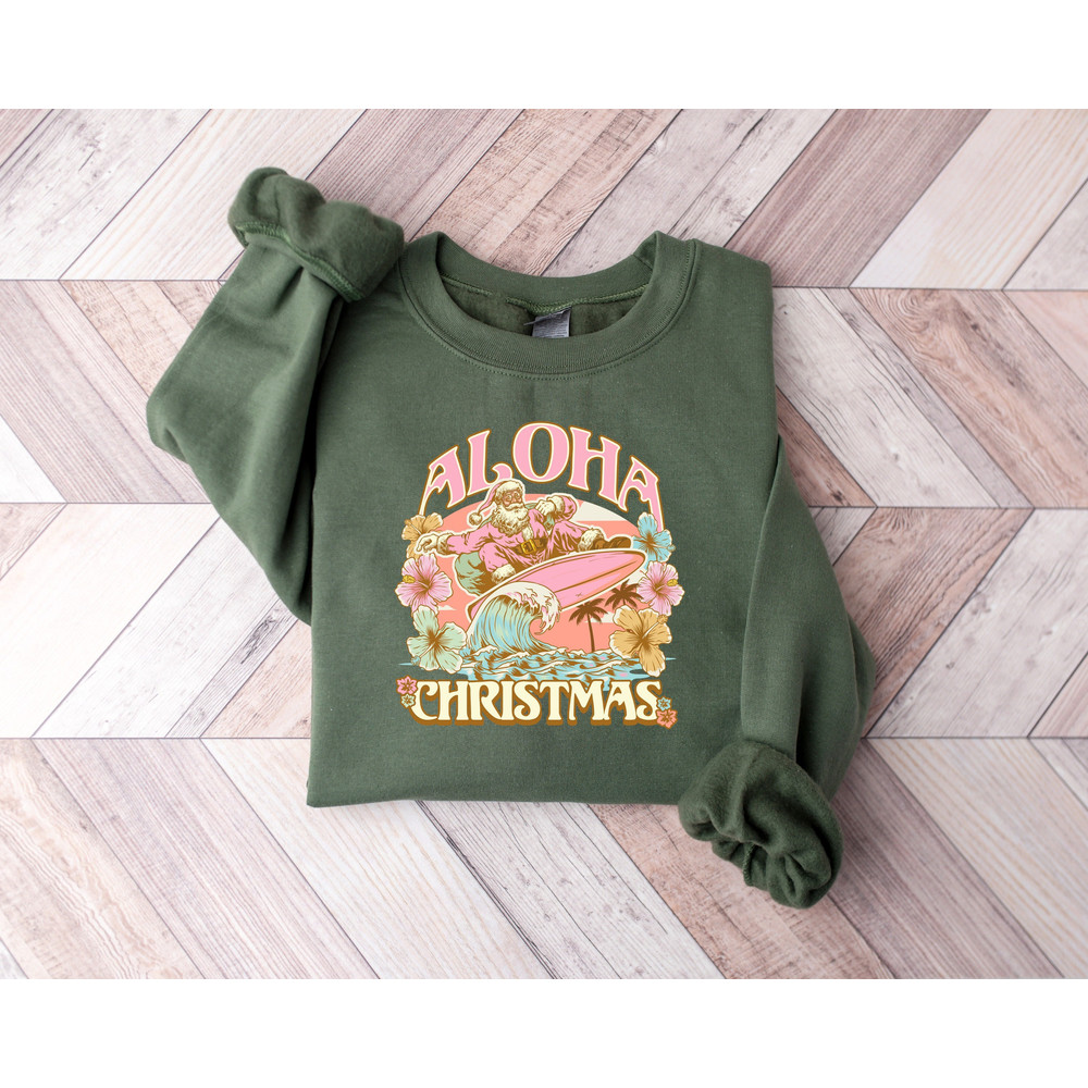 Aloha Christmas Santa Shirt, Retro Santa Summer T-shirt, Santa Beach Sweater, Pink Santa Surfing Sweatshirt, Christmas Cow, Christmas Gifts.jpg