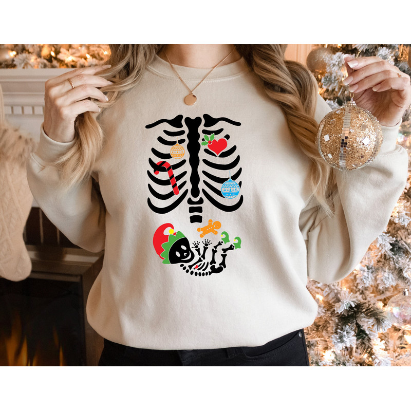 Christmas Baby Announcement Sweatshirt, Christmas Pregnant Mom Sweater, Christmas Skeleton Baby Shirt, Baby is Coming, Mom and Baby T-shirt.jpg