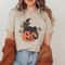 Black Cat on Pumpkin Shirt, Pumpkin shirt Shirt, For fall, Black Cat Shirt, Halloween Black Cat Design, Halloween Gifts for Cat Owner.jpg
