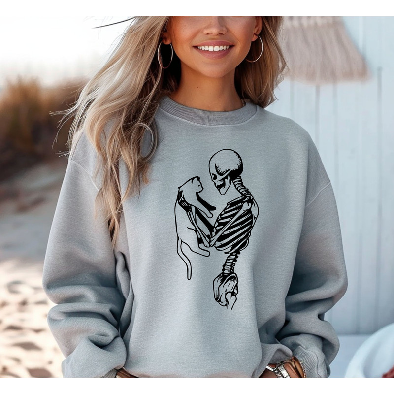 Comfort Colors® Skeleton Holding Cat Sweatshirt, Skeleton And Cat Sweater, Skeleton Hoodie, Cat Lover Skeleton Sweater, Cat Mom, Cat Hoodie.jpg