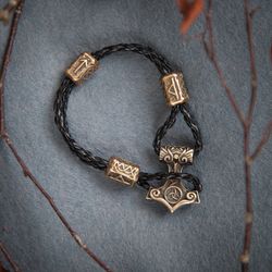 Viking bracelet on leather cord with Thor hammer Mjolnir and beads. Pagan handcrafted jewelry. Scandinavian Futhark rune