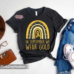 rainbow in september we wear gold childhood cancer awareness tshirt, childhood cancer support shirt, gold ribbon sweatsh